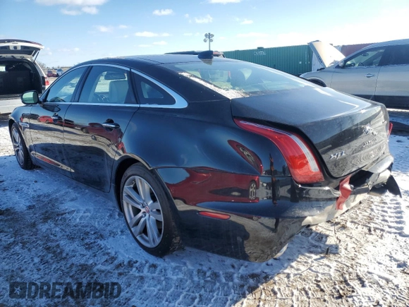 2016 Jaguar XJ Portfolio with VIN SAJWA2G78G8V94534, listed as a Copart auction lot 86926944 with 144,093 mi miles and Salvage title. Bid and sale history available at DreamBid. Image 2.
