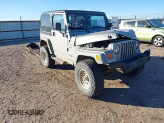 2001 Jeep Wrangler Sport with VIN 1J4FA49S91P324912, listed as a IAAI auction lot 41261214 with 260,299 mi miles. Bid and sale history available at carsss.com. Image 1.