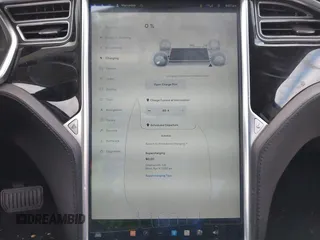 2013 Tesla Model S with VIN 5YJSA1DG7DFP11382, listed as a IAAI auction lot 42056169 with 126,975 mi miles. Bid and sale history available at carsss.com. Image 17.