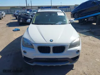 2015 BMW X1 sDrive28i with VIN WBAVM1C51FVZ94433, listed as a IAAI auction lot 41425205 with 148,346 mi miles. Bid and sale history available at carsss.com. Image 12.