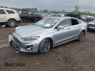 2020 Ford Fusion Titanium with VIN 3FA6P0D98LR115437, listed as a IAAI auction lot 42331052 with 127,346 mi miles and . Bid and sale history available at DreamBid. Image 17.