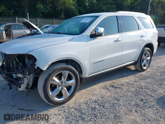 2013 Dodge Durango Citadel with VIN 1C4SDJET6DC652552, listed as a IAAI auction lot 42602746 with 163,602 mi miles and . Bid and sale history available at DreamBid. Image 2.