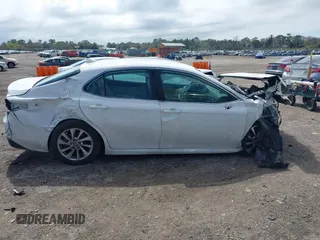 2023 Toyota Camry LE with VIN 4T1C11AK9PU158190, listed as a IAAI auction lot 41666927 with 92,730 mi miles and . Bid and sale history available at DreamBid. Image 14.