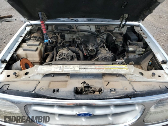1996 Ford Explorer XL z VIN 1FMDU34X7TUD53066, wystawiony jako Copart lot #52031465 z przebiegiem 142 895 mil mil oraz Szkoda całkowita • Salvage title. Historia ofert i sprzedaży dostępna na DreamBid. Obrazek 12.