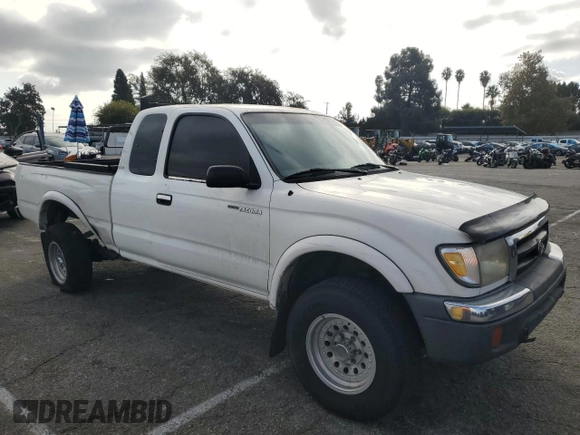 1999 Toyota Tacoma PreRunner with VIN 4TASM92NXXZ476400, listed as a Copart auction lot 81001204 with 280,797 mi miles and Salvage title. Bid and sale history available at DreamBid. Image 4.