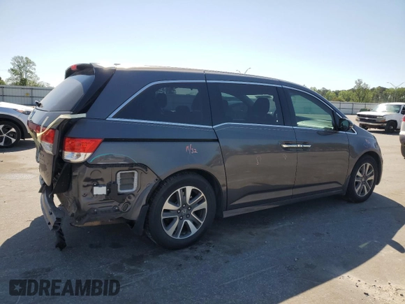 2016 Honda Odyssey Touring Elite with VIN 5FNRL5H91GB088163, listed as a Copart auction lot 50276495 with 197,274 mi miles and Salvage Title. Bid and sale history available at DreamBid. Image 3.