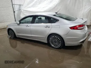 2017 Ford Fusion Hybrid Titanium with VIN 3FA6P0RU7HR383920, listed as a Copart auction lot 56320585 with 20,446 mi miles and Non repairable. Bid and sale history available at DreamBid. Image 2.
