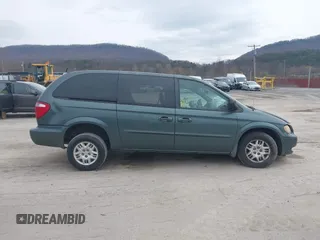 2003 Dodge Grand Caravan with VIN 2D4GP44313R240791, listed as a IAAI auction lot 41937009 with 231,913 mi miles and . Bid and sale history available at DreamBid. Image 12.
