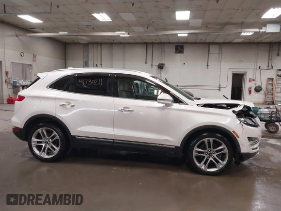 2019 Lincoln MKC Reserve with VIN 5LMCJ3D9XKUL17812, listed as a IAAI auction lot 41730211 with 56,716 mi miles and . Bid and sale history available at DreamBid. Image 14.