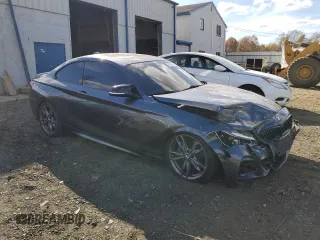 2015 BMW 2 Series M235i xDrive with VIN WBA1J9C5XFV370961, listed as a Copart auction lot 78313054 with 99,245 mi miles and Salvage Title. Bid and sale history available at carsss.com. Image 4.