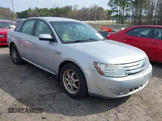 2009 Ford Taurus SE with VIN 1FAHP23W69G118350, listed as a IAAI auction lot 41806537 with 243,428 mi miles. Bid and sale history available at carsss.com. Image 1.