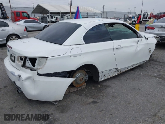 2011 BMW 3 Series 335i with VIN WBADX7C50BE579944, listed as a IAAI auction lot 42111612 with Not Provided miles and . Bid and sale history available at carsss.com. Image 4.