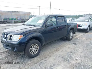2015 Nissan Frontier S with VIN 1N6AD0EV2FN735908, listed as a IAAI auction lot 42388456 with 164,889 mi miles and . Bid and sale history available at DreamBid. Image 2.