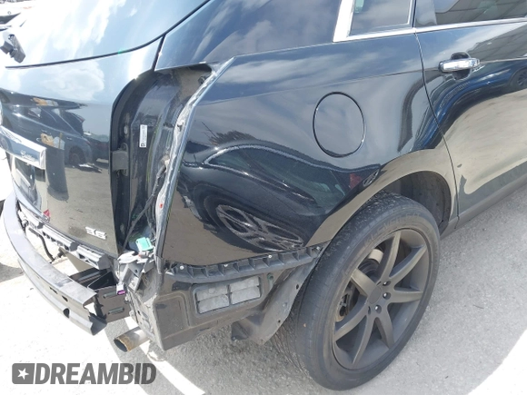 2014 Cadillac SRX Luxury Collection with VIN 3GYFNBE34ES639647, listed as a IAAI auction lot 42108140 with 99,740 mi miles and . Bid and sale history available at DreamBid. Image 18.