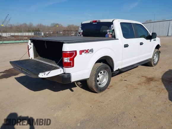 2019 Ford F-150 XL with VIN 1FTEW1EP8KKD98520, listed as a IAAI auction lot 41775566 with 128,021 mi miles. Bid and sale history available at carsss.com. Image 4.