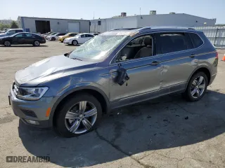 2021 Volkswagen Tiguan SE with VIN 3VV2B7AX2MM075326, listed as a Copart auction lot 52449985 with 8,034 mi miles and Salvage Title. Bid and sale history available at carsss.com. Image 1.