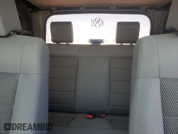 2009 Jeep Wrangler Sahara with VIN 1J4FA54119L747068, listed as a Copart auction lot 71209904 with 86,978 mi miles and Salvage title. Bid and sale history available at DreamBid. Image 10.