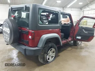 2011 Jeep Wrangler Sport z VIN 1J4AA2D19BL613164, wystawiony jako IAAI lot #42514207 z przebiegiem Nie podano mil oraz . Historia ofert i sprzedaży dostępna na DreamBid. Obrazek 4.