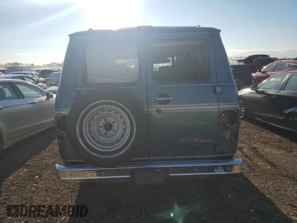 1995 GMC Vandura z VIN 1GDEG25K2SF543904, wystawiony jako Copart lot #68934904 z przebiegiem 949 271 mil mil oraz Szkoda całkowita • Salvage title. Historia ofert i sprzedaży dostępna na DreamBid. Obrazek 6.