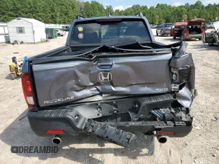 2022 Honda Ridgeline RTL-E with VIN 5FPYK3F72NB000908, listed as a Copart auction lot 65631535 with 35,796 mi miles and Salvage title. Bid and sale history available at DreamBid. Image 6.