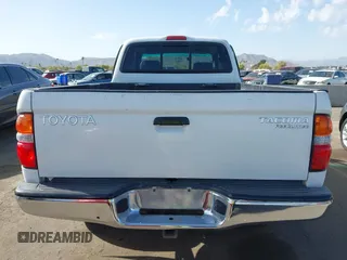 2002 Toyota Tacoma PreRunner z VIN 5TESM92N32Z883802, wystawiony jako IAAI lot #41949270 z przebiegiem 219 690 mil mil oraz . Historia ofert i sprzedaży dostępna na DreamBid. Obrazek 16.