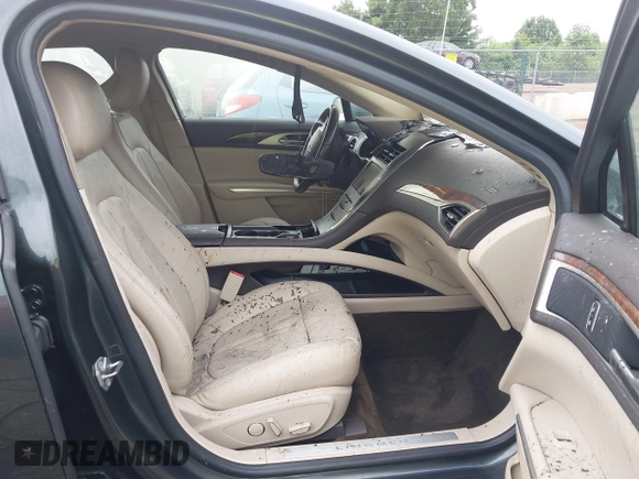 2016 Lincoln MKZ z VIN 3LN6L2GK4GR605486, wystawiony jako IAAI lot #42609084 z przebiegiem Nie podano mil oraz . Historia ofert i sprzedaży dostępna na DreamBid. Obrazek 5.