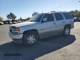 2005 GMC Yukon SLE with VIN 1GKEC13T95J150381, listed as a Copart auction lot 77405144 with 176,516 mi miles and Clean Title. Bid and sale history available at carsss.com. Image 1.