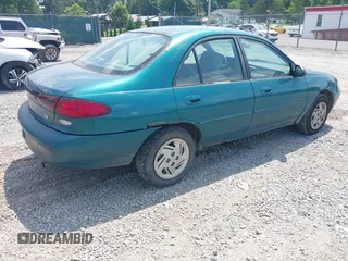 1997 Ford Escort LX with VIN 1FALP13P8VW184766, listed as a IAAI auction lot 40039873 with 104,604 mi miles. Bid and sale history available at carsss.com. Image 4.