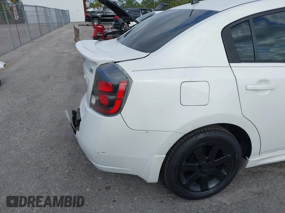2012 Nissan Sentra 2.0 z VIN 3N1AB6AP0CL701340, wystawiony jako IAAI lot #42094800 z przebiegiem 189 128 mil mil oraz . Historia ofert i sprzedaży dostępna na DreamBid. Obrazek 6.