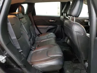 2015 Jeep Cherokee Trailhawk z VIN 1C4PJMBS0FW598694, wystawiony jako Copart lot #60731615 z przebiegiem 130 219 mil mil oraz Czysty tytuł • Clean title. Historia ofert i sprzedaży dostępna na DreamBid. Obrazek 11.