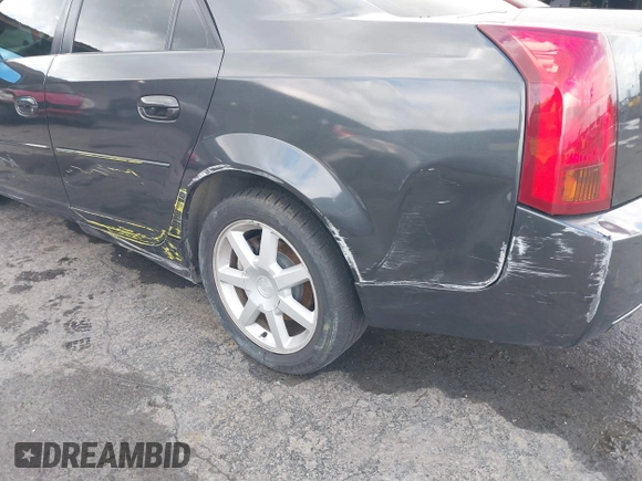 2005 Cadillac CTS with VIN 1G6DP567350117077, listed as a IAAI auction lot 41815270 with 90,860 mi miles and . Bid and sale history available at DreamBid. Image 12.