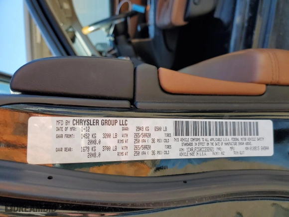 2012 Jeep Grand Cherokee Overland with VIN 1C4RJFCG0CC232021, listed as a Copart auction lot 89358695 with 129,196 mi miles and Salvage Title. Bid and sale history available at carsss.com. Image 15.