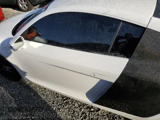 2014 Audi R8 V8 z VIN WUADUAFG5EN000704, wystawiony jako Copart lot #73885864 z przebiegiem Nie podano mil oraz Szkoda całkowita • Salvage title. Historia ofert i sprzedaży dostępna na DreamBid. Obrazek 12.