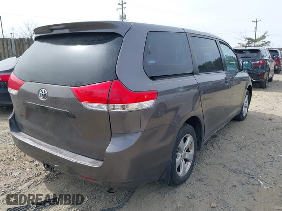2012 Toyota Sienna with VIN 5TDKA3DC9CS011298, listed as a IAAI auction lot 41843980 with 158,787 mi miles and . Bid and sale history available at DreamBid. Image 4.