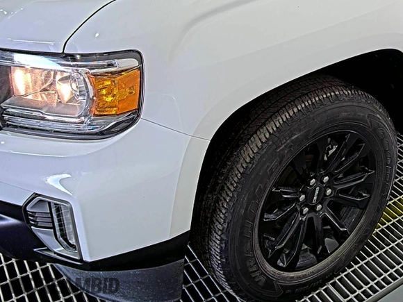 2021 GMC Canyon 2WD Elevation z VIN 1GTG5CEN5M1140499, wystawiony jako IAAI lot #42556124 z przebiegiem 41 450 mil mil oraz . Historia ofert i sprzedaży dostępna na DreamBid. Obrazek 23.