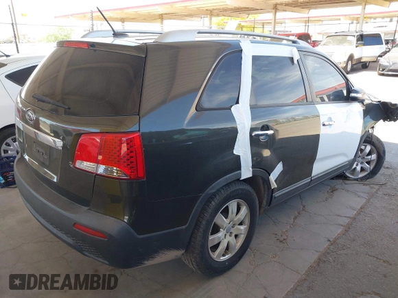2012 Kia Sorento LX with VIN 5XYKT4A21CG242866, listed as a IAAI auction lot 42172159 with 217,651 mi miles. Bid and sale history available at carsss.com. Image 4.