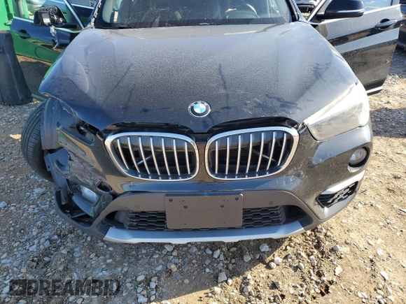 2017 BMW X1 xDrive28i with VIN WBXHT3C35H5F68640, listed as a Copart auction lot 85563114 with 103,480 mi miles and Salvage Title. Bid and sale history available at carsss.com. Image 12.