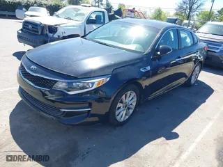 2016 Kia Optima LX with VIN 5XXGT4L3XGG013835, listed as a IAAI auction lot 41815349 with 120,628 mi miles. Bid and sale history available at carsss.com. Image 17.