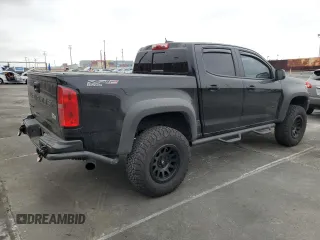 2021 Chevrolet Colorado 4WD ZR2 with VIN 1GCGTEEN3M1293299, listed as a Copart auction lot 59809995 with 21,890 mi miles and Salvage title. Bid and sale history available at DreamBid. Image 3.