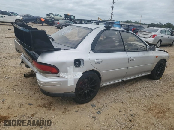 1995 Subaru Impreza with VIN GC8030988, listed as a Copart auction lot 70242354 with 123,696 mi miles and Salvage title. Bid and sale history available at DreamBid. Image 3.
