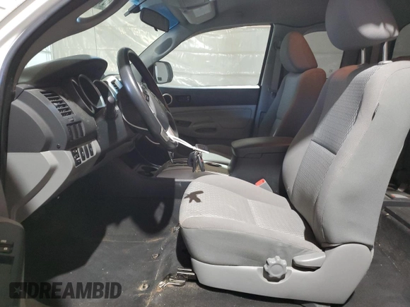 2015 Toyota Tacoma z VIN 5TFUX4EN7FX039029, wystawiony jako Copart lot #55161325 z przebiegiem 27 791 mil mil oraz Szkoda całkowita • Salvage title. Historia ofert i sprzedaży dostępna na DreamBid. Obrazek 7.