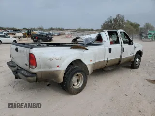 2006 Ford F-350 XL with VIN 1FTWW31P86EB49029, listed as a Copart auction lot 50140405 with 126,196 mi miles and Salvage Title. Bid and sale history available at DreamBid. Image 3.