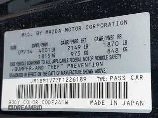 2015 Mazda Mazda3 i Touring with VIN JM1BM1V77F1226189, listed as a IAAI auction lot 41838696 with 146,764 mi miles. Bid and sale history available at carsss.com. Image 9.
