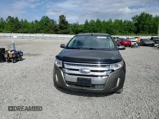 2014 Ford Edge SEL z VIN 2FMDK4JC7EBA47264, wystawiony jako Copart lot #54201255 z przebiegiem 135 408 mil mil oraz Szkoda całkowita • Salvage title. Historia ofert i sprzedaży dostępna na DreamBid. Obrazek 14.