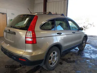 2008 Honda CR-V LX with VIN JHLRE38338C042071, listed as a IAAI auction lot 42047743 with 223,027 mi miles and . Bid and sale history available at carsss.com. Image 4.