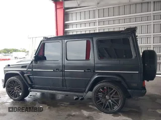 2014 Mercedes-Benz G-Class G 63 AMG with VIN WDCYC7DF7EX221914, listed as a IAAI auction lot 40192383 with 59,131 mi miles. Bid and sale history available at carsss.com. Image 14.