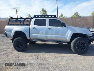 2013 Toyota Tacoma with VIN 5TFLU4EN2DX049615, listed as a IAAI auction lot 41893876 with 160,752 mi miles and . Bid and sale history available at DreamBid. Image 13.