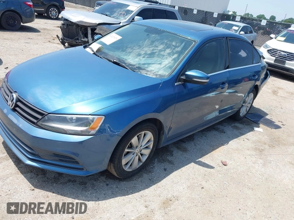 2015 Volkswagen Jetta SE with VIN 3VWD17AJ3FM260636, listed as a IAAI auction lot 42423975 with 129,377 mi miles and . Bid and sale history available at DreamBid. Image 2.