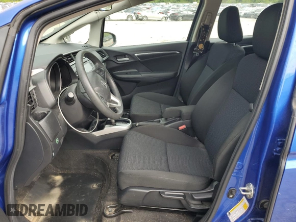 2020 Honda Fit LX with VIN 3HGGK5H49LM703516, listed as a Copart auction lot 58334085 with 58,986 mi miles and Salvage title. Bid and sale history available at DreamBid. Image 7.
