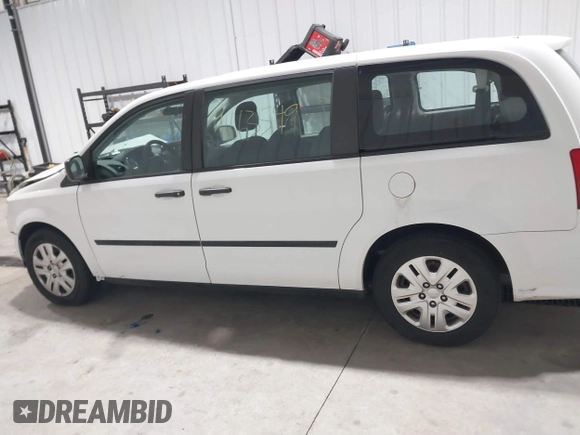 2016 Dodge Grand Caravan SE with VIN 2C4RDGBG1GR392484, listed as a IAAI auction lot 41663549 with 126,882 mi miles and . Bid and sale history available at DreamBid. Image 14.